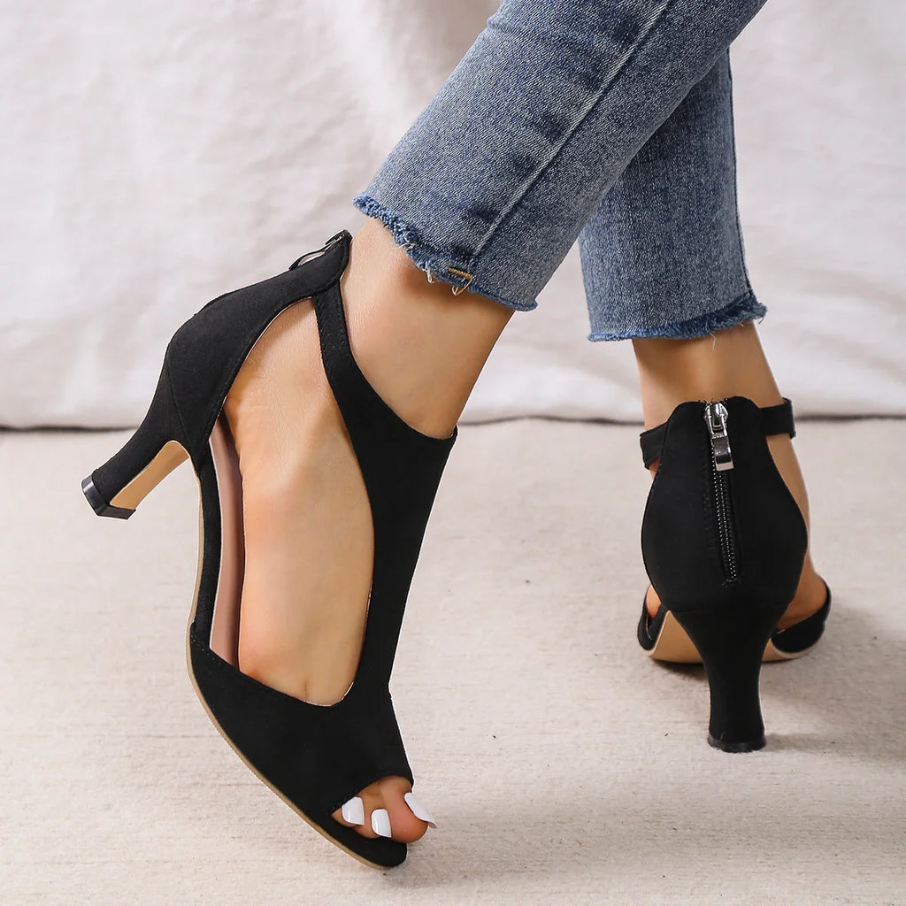 Leather high heels shoes from Plush Fashion Hub, stylish footwear with sleek design and pointed toe for elegant occasions.