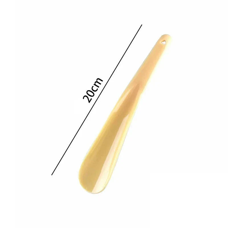 Plastic shoe horn by Plush Fashion Hub, extra long, flexible, durable, designed for pregnant women to easily assist with shoes.
