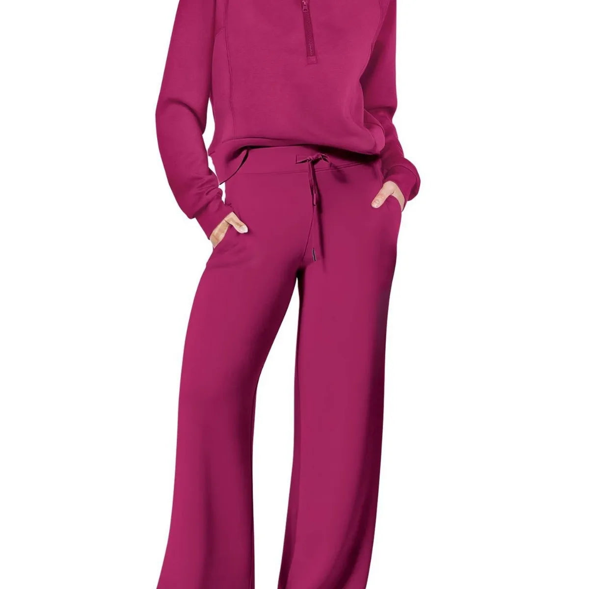 Women two-piece sweatshirt and wide-leg pants set by Plush Fashion Hub, featuring comfortable casual wear, shown in black and relaxed fit.