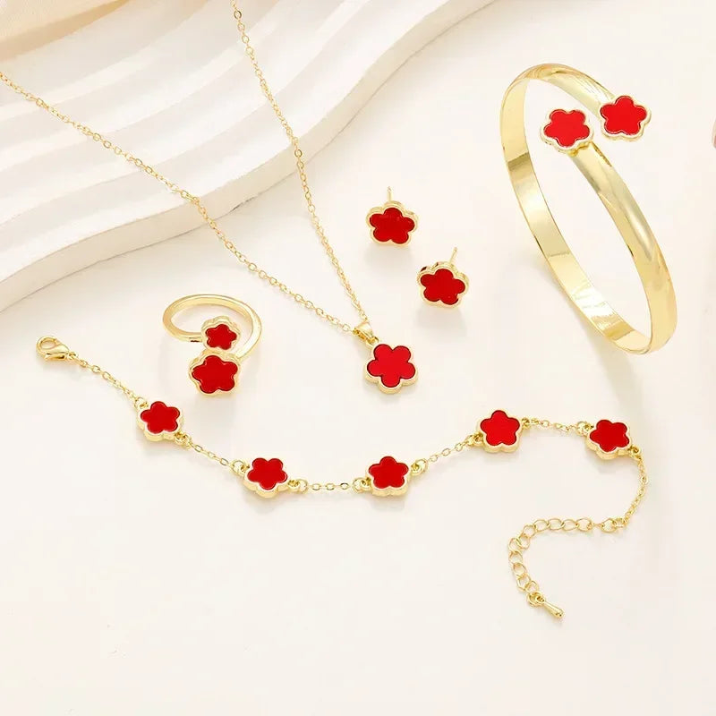 Plum Blossom Plant five-leaf necklace and earring set with floral design, featuring gold-toned jewelry from Plush Fashion Hub.