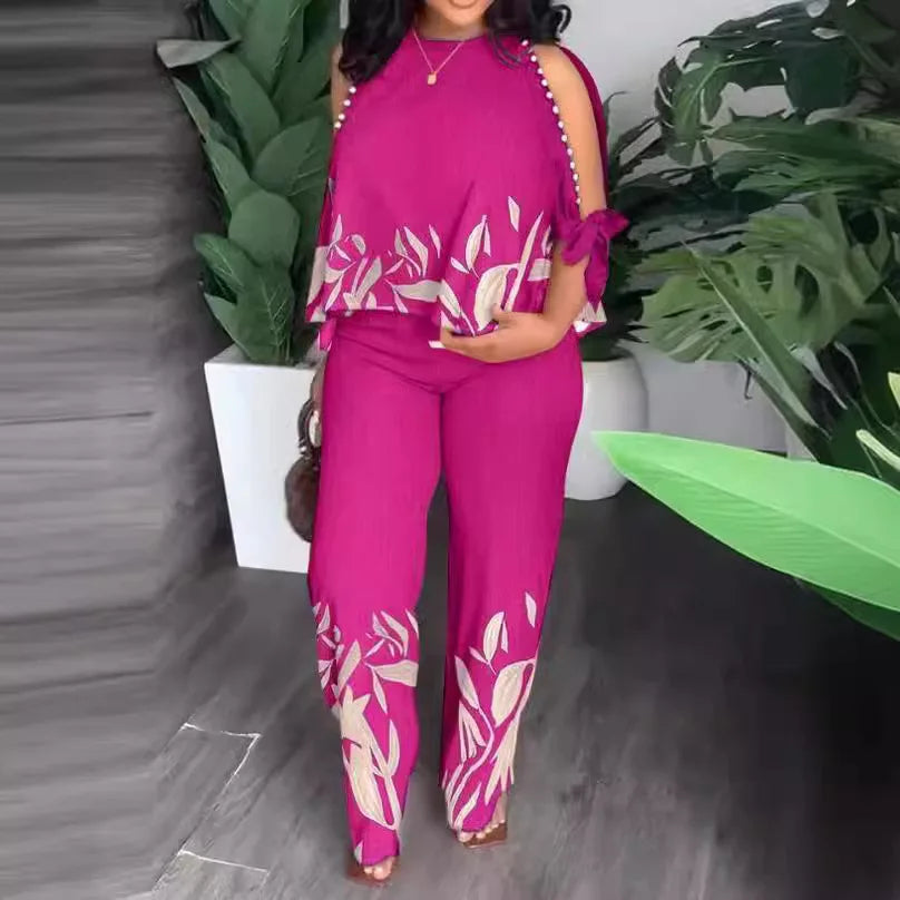Plus size women’s two-piece outfit with short sleeves, stylish fashion set by Plush Fashion Hub, shown in a casual, trendy look.