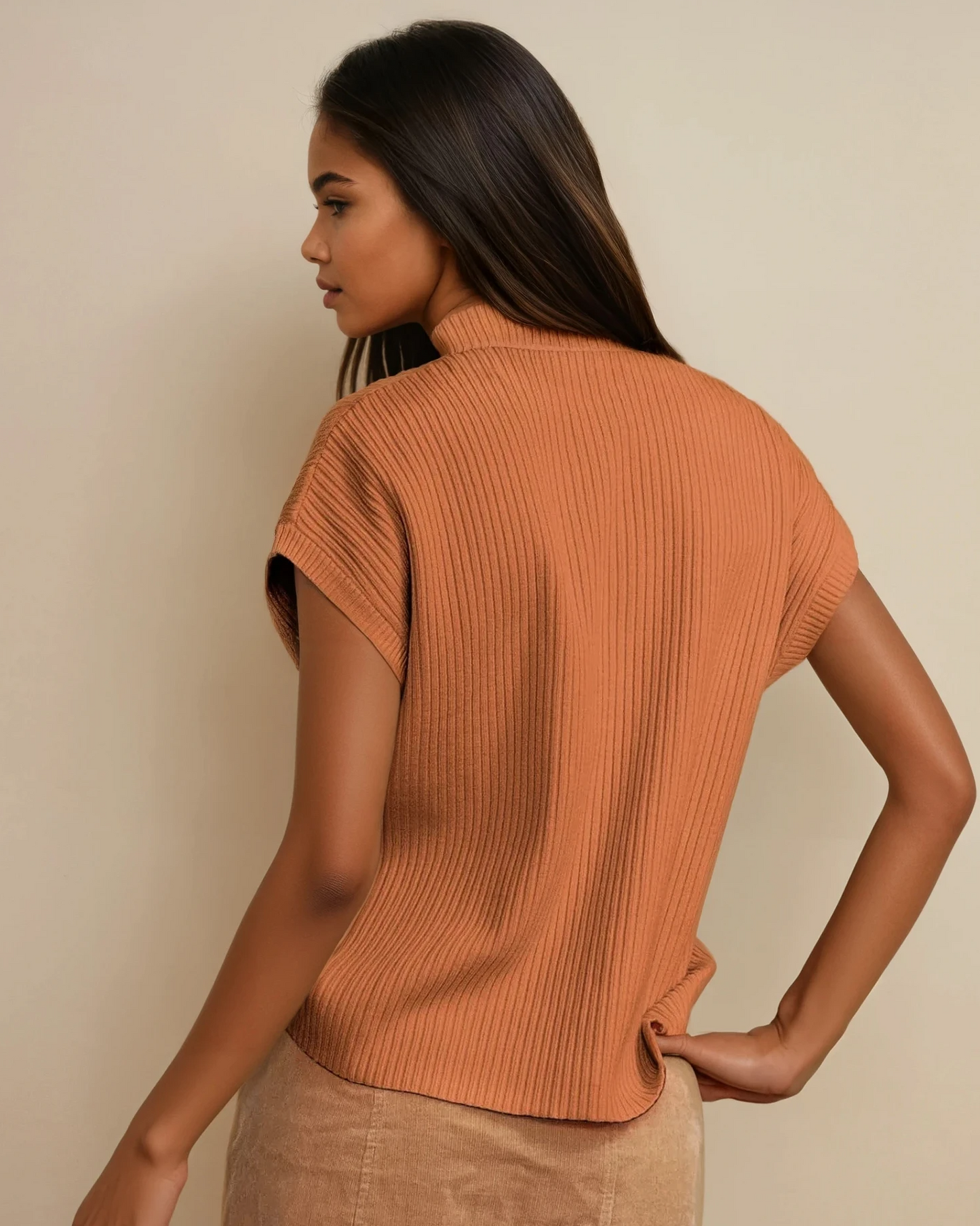 Orange knit short sleeve sweater by Indie & Co., featuring a cozy, stylish design perfect for casual wear.