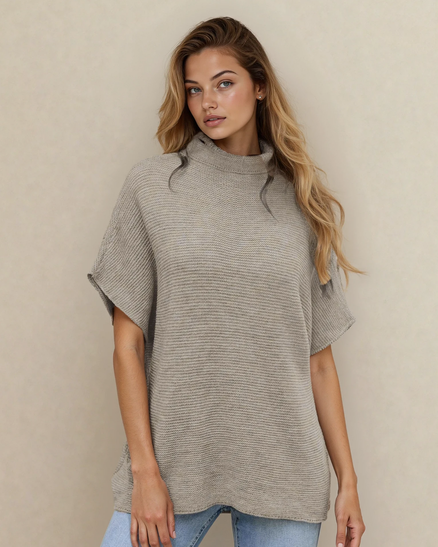 Indie & Co. Maya mock neck short sleeve sweater in stone color, casual shirt with a fitted design, displayed on a model.