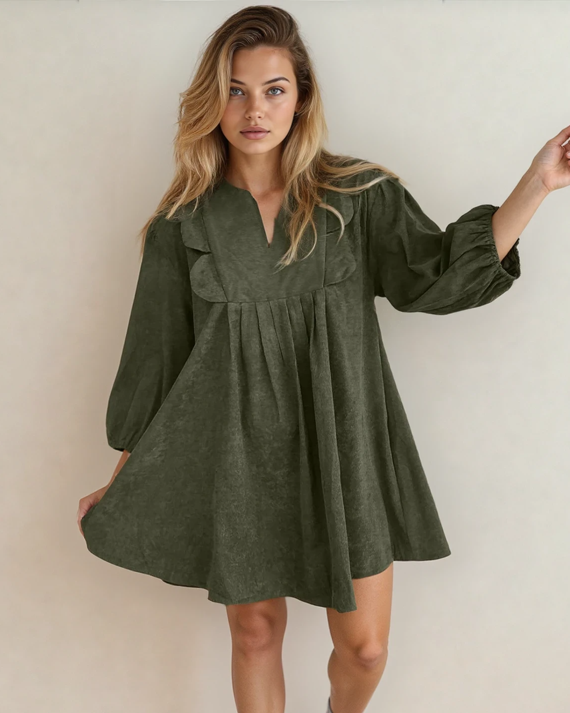 Green Micah scallop detail pleated corduroy mini dress by Indie & Co., featuring a short dress design with scallop accents.