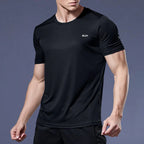 Men's Plush Fashion Hub quick-dry compression shirt, activewear with moisture-wicking fabric, close-up of black athletic top.