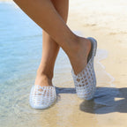 Plush Fashion Hub summer ladies jelly sandals with flat bottom, hollow design, crystal accents, and breathable slip-on beach slippers