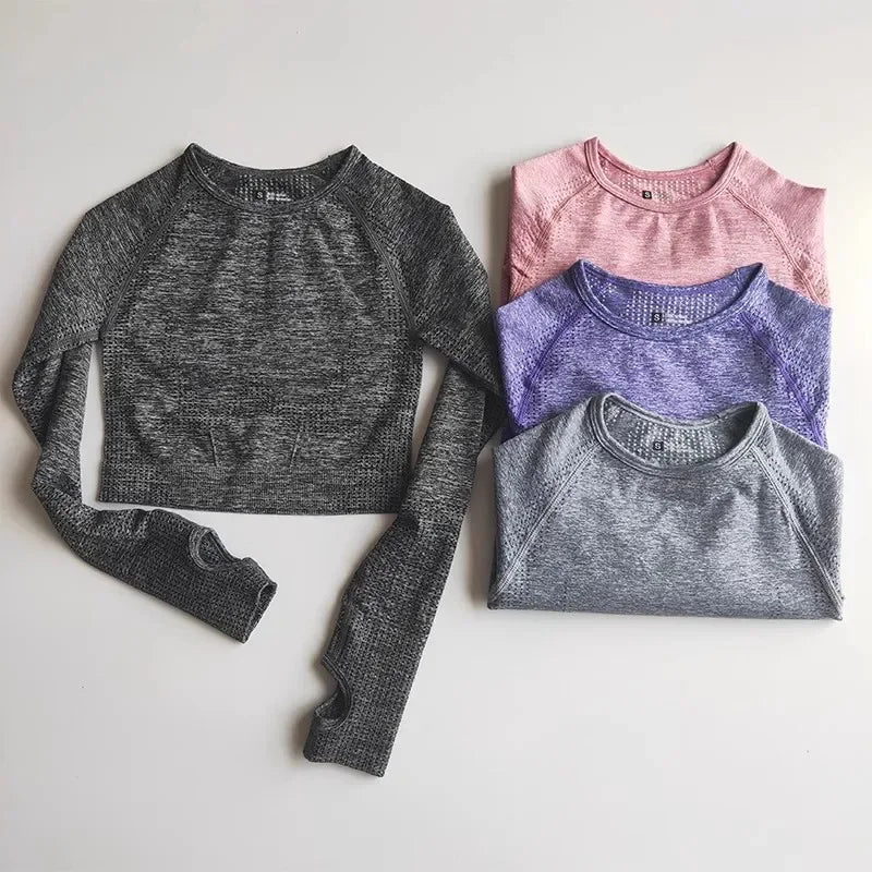 Seamless women's yoga crop top from Plush Fashion Hub, made of stretchy, breathable activewear fabric for comfortable workouts.