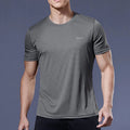 Men's Quick-Dry Compression Shirt by Plush Fashion Hub, activewear, shown in black with a sleek fit and moisture-wicking fabric.