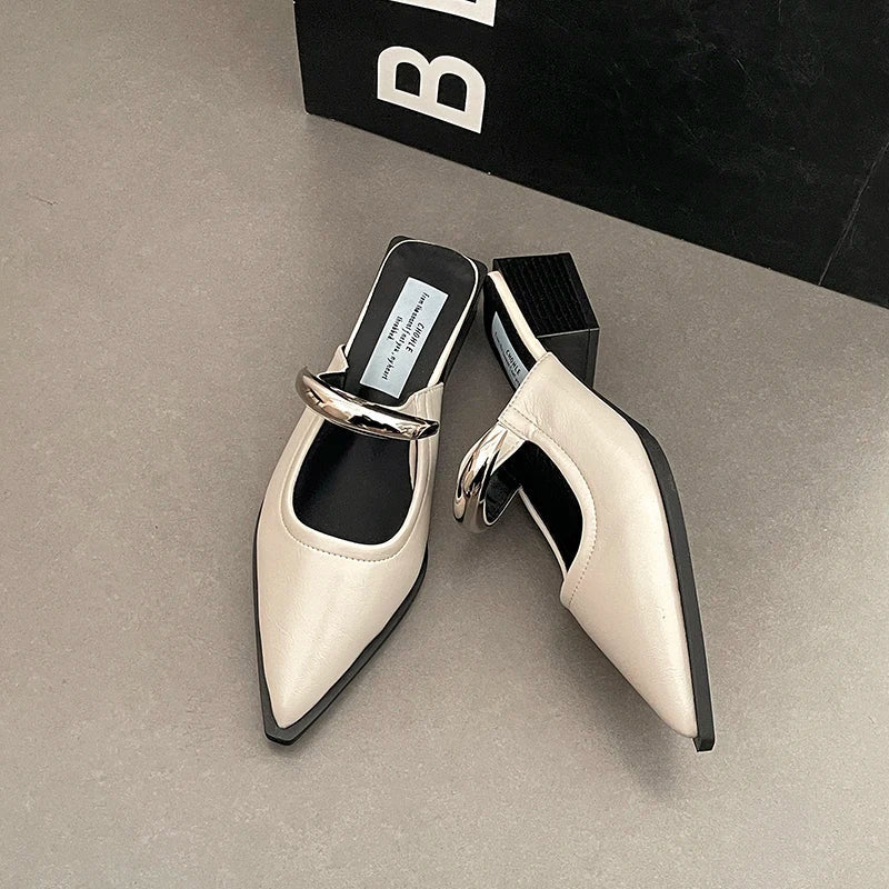 Summer women’s slip-on mules with metal decoration, thick heel, and comfortable street style footwear by Plush Fashion Hub.