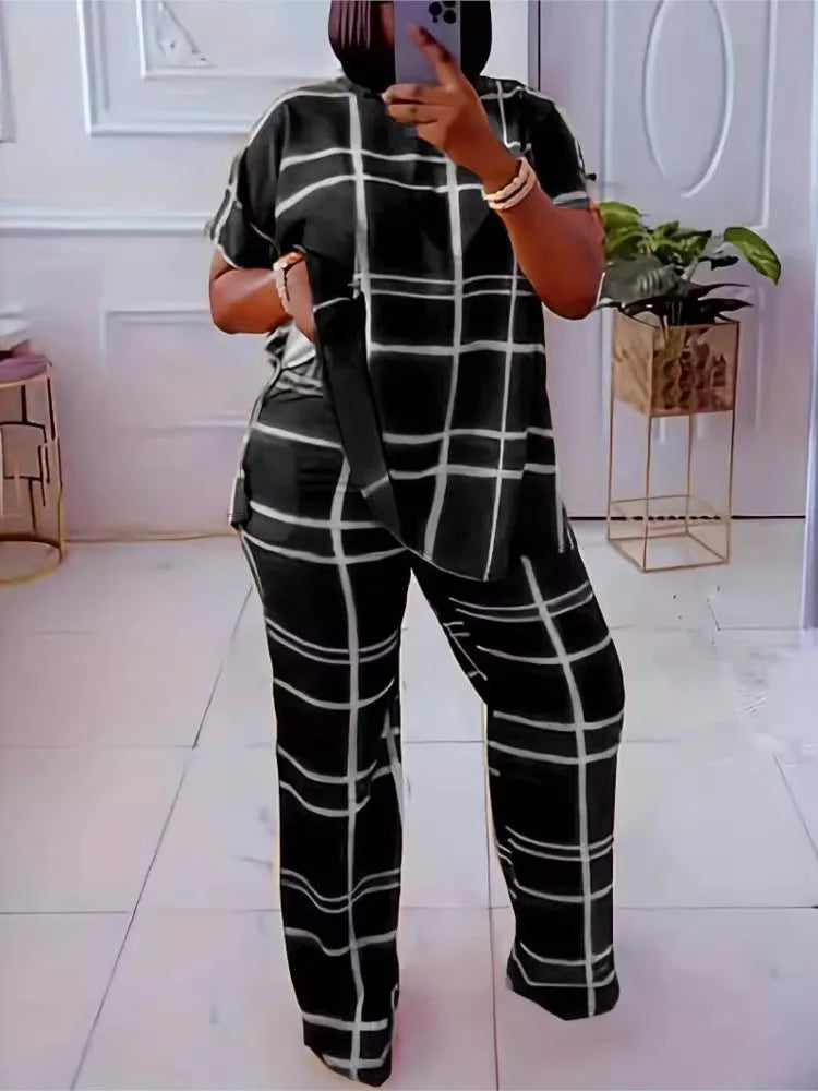 Plus size women’s two-piece set by Plush Fashion Hub featuring a striped grid pattern and casual round neck top.