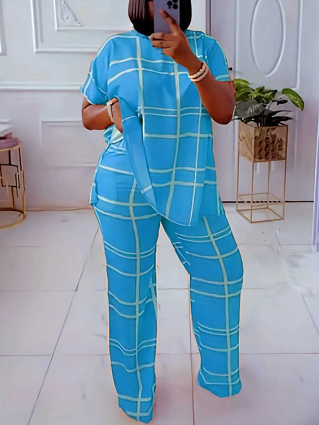 Plus size women’s casual two-piece set with striped grid print and round neck from Plush Fashion Hub, featuring a stylish, comfortable design.