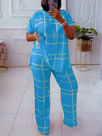 Plus size women’s casual two-piece set with striped grid print and round neck from Plush Fashion Hub, featuring a stylish, comfortable design.