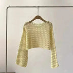 Women’s crochet knit beach cover-up by FitiqueFit, casualwear style with intricate crochet pattern, perfect for beach or poolside wear.