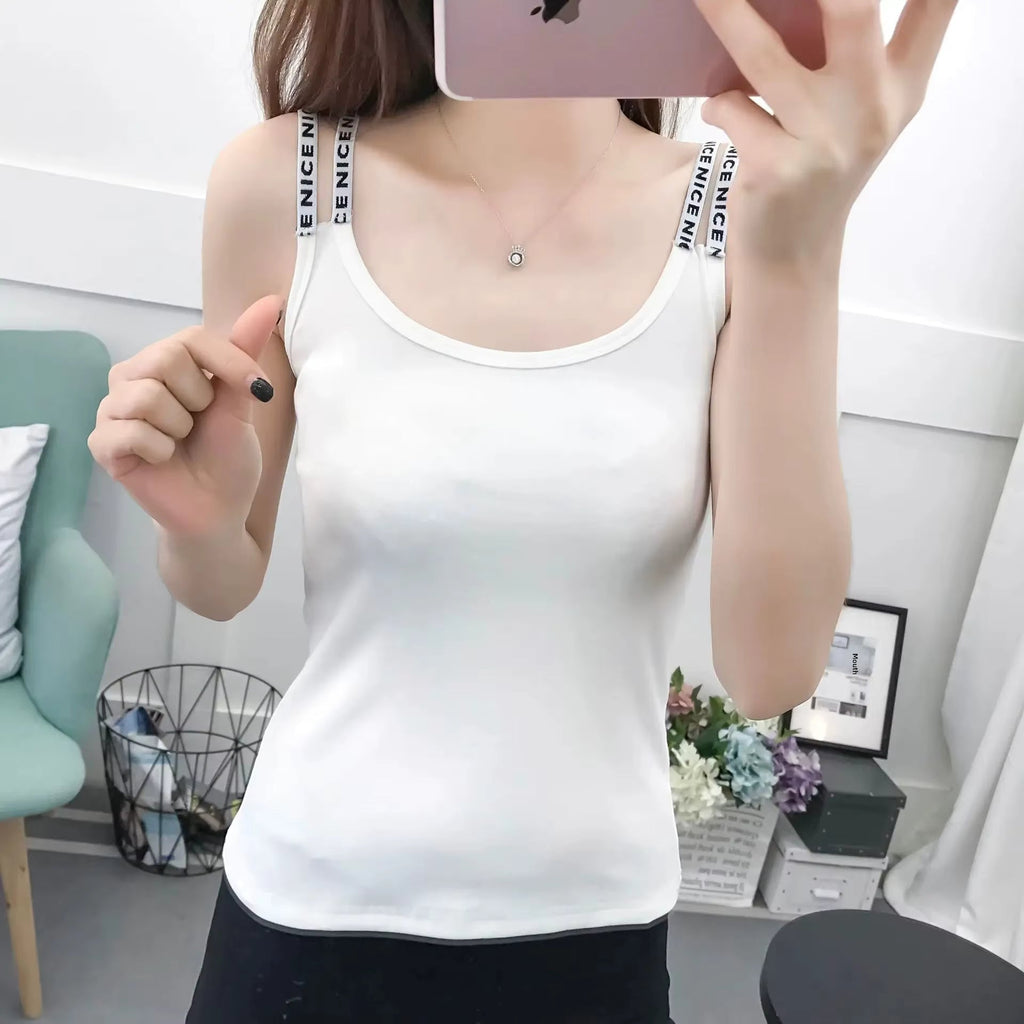Women’s solid color sleeveless tank top by Plush Fashion Hub, casualwear style, shown in a relaxed fit with smooth fabric.