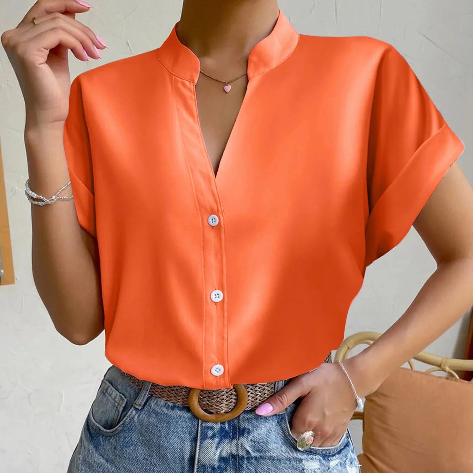 Light orange satin V-neck short sleeve shirt for women by Plush Fashion Hub, elegant casual summer wear.