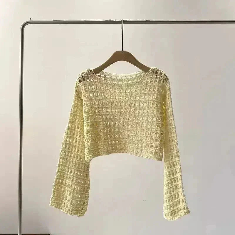 Women’s crochet knit beach cover-up by FitiqueFit, casualwear style with intricate crochet details for a breezy summer look.