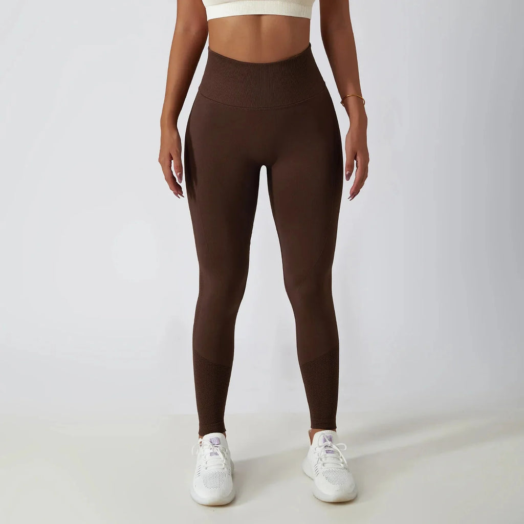 Seamless ribbed yoga leggings by FitiqueFit featuring tummy control fit, high-waisted activewear for comfortable movement and support.