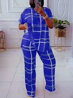 Plus size women’s casual two-piece set with striped grid print and round neck from Plush Fashion Hub, featuring a comfortable, stylish design.