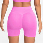 Women's seamless scrunch butt gym shorts by NCLAGEN Gym Wear for high-performance fitness and yoga workouts.