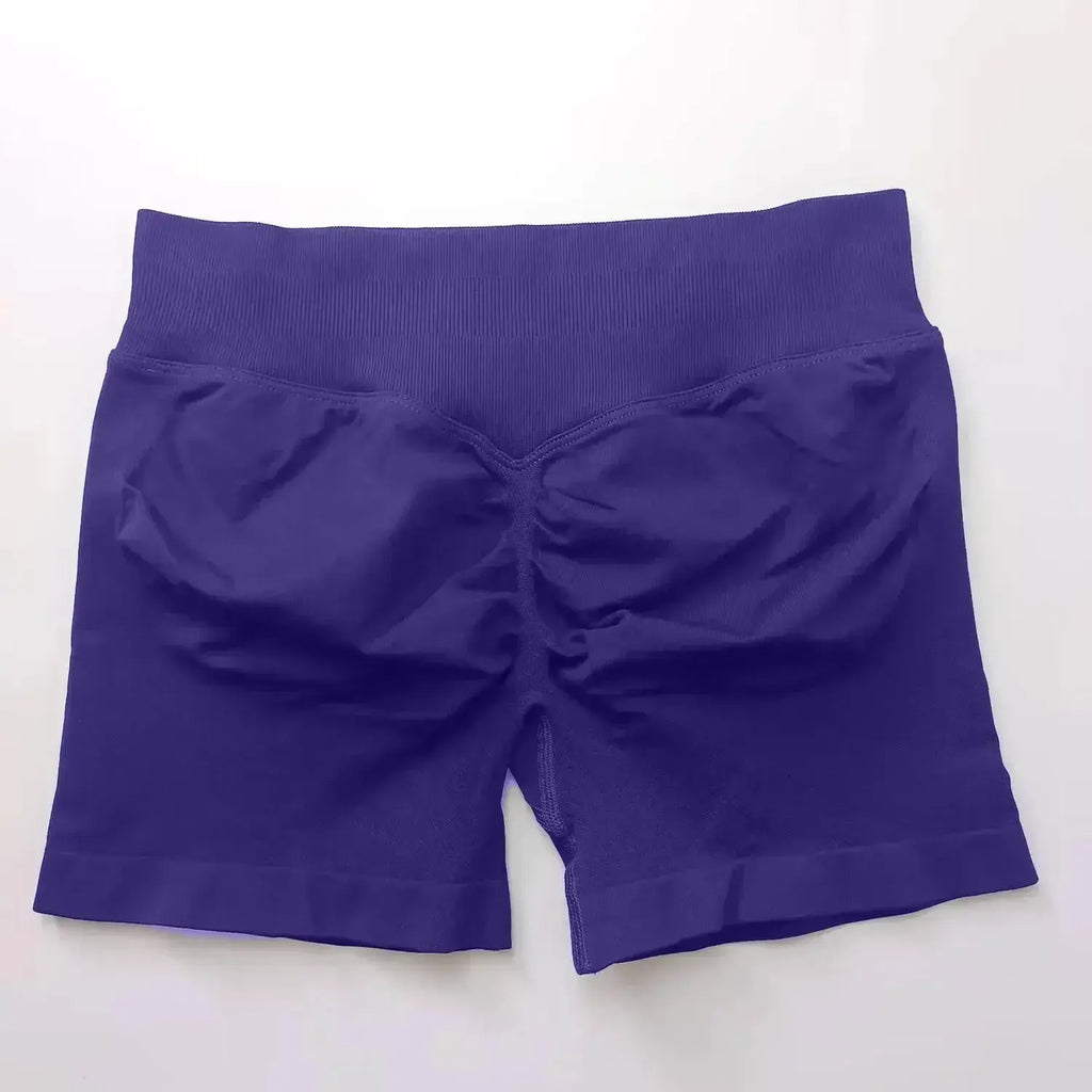 Women's seamless scrunch butt gym shorts for fitness and yoga, designed for high-performance workouts by NCLAGEN Gym Wear.