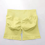 Women's seamless scrunch butt gym shorts for fitness and yoga, designed for high-performance workouts by NCLAGEN Gym Wear.