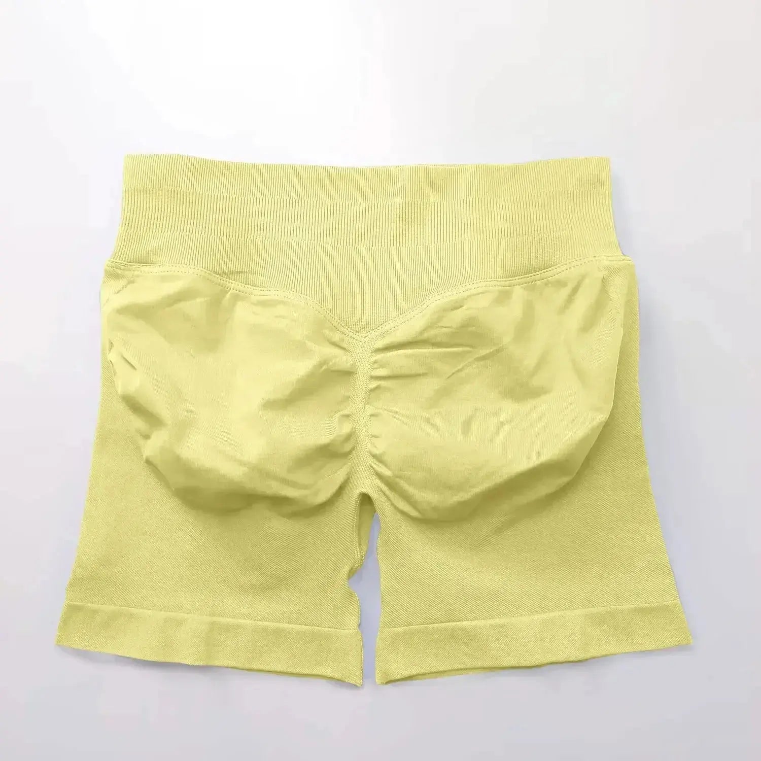 Women's seamless scrunch butt gym shorts for fitness and yoga, designed for high-performance workouts by NCLAGEN Gym Wear.
