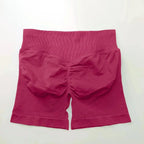 Women's seamless scrunch butt gym shorts for fitness and yoga, designed for high-performance workouts, by NCLAGEN Gym Wear.