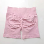 Women's seamless gym shorts with scrunch butt design for fitness and yoga, by NCLAGEN Gym Wear, showcasing a comfortable, high-performance fit.