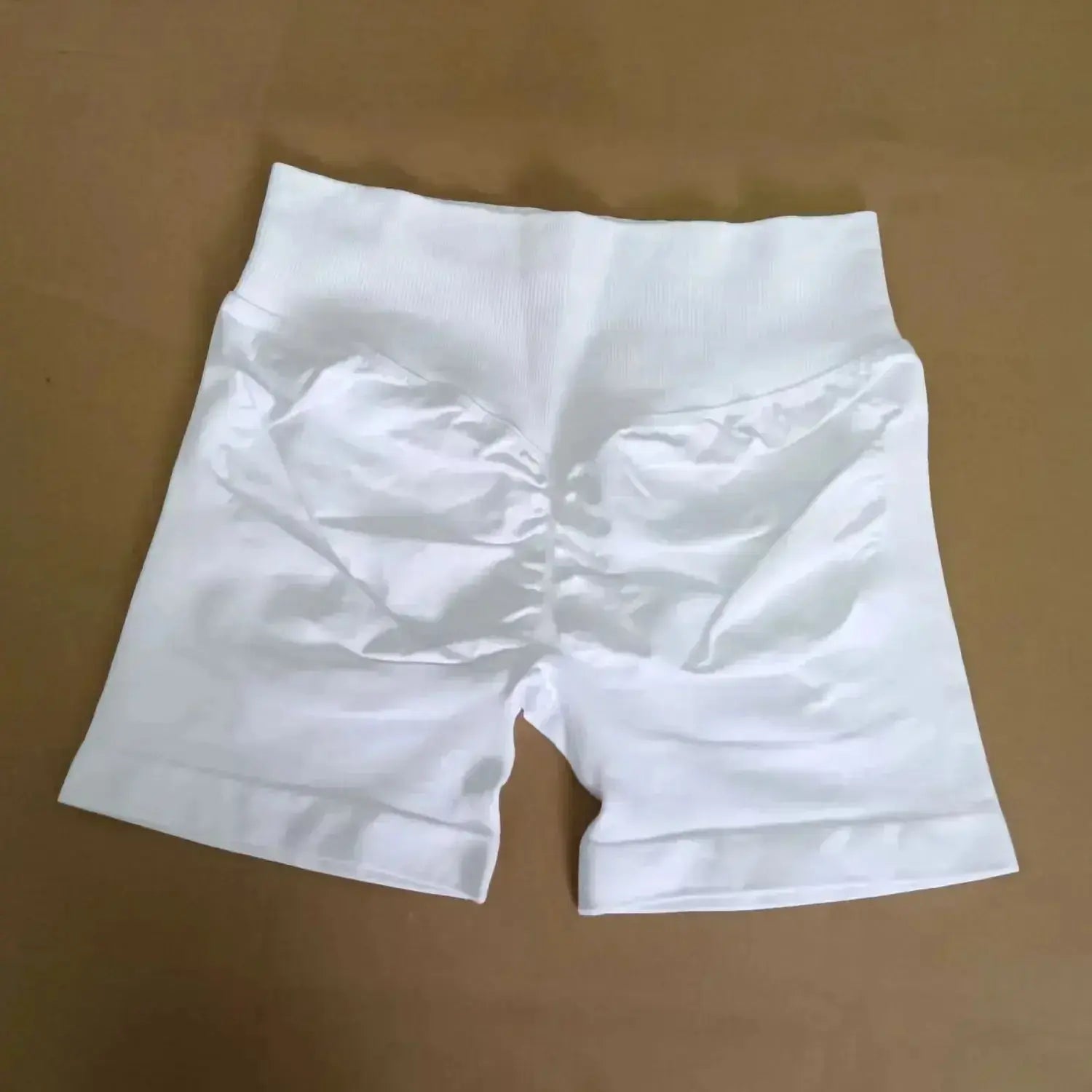 Women's seamless scrunch butt gym shorts by NCLAGEN Gym Wear, designed for high-performance fitness and yoga.