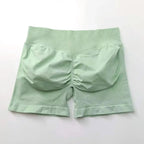 Women's seamless scrunch butt gym shorts for fitness and yoga, designed for high-performance workouts by NCLAGEN Gym Wear.