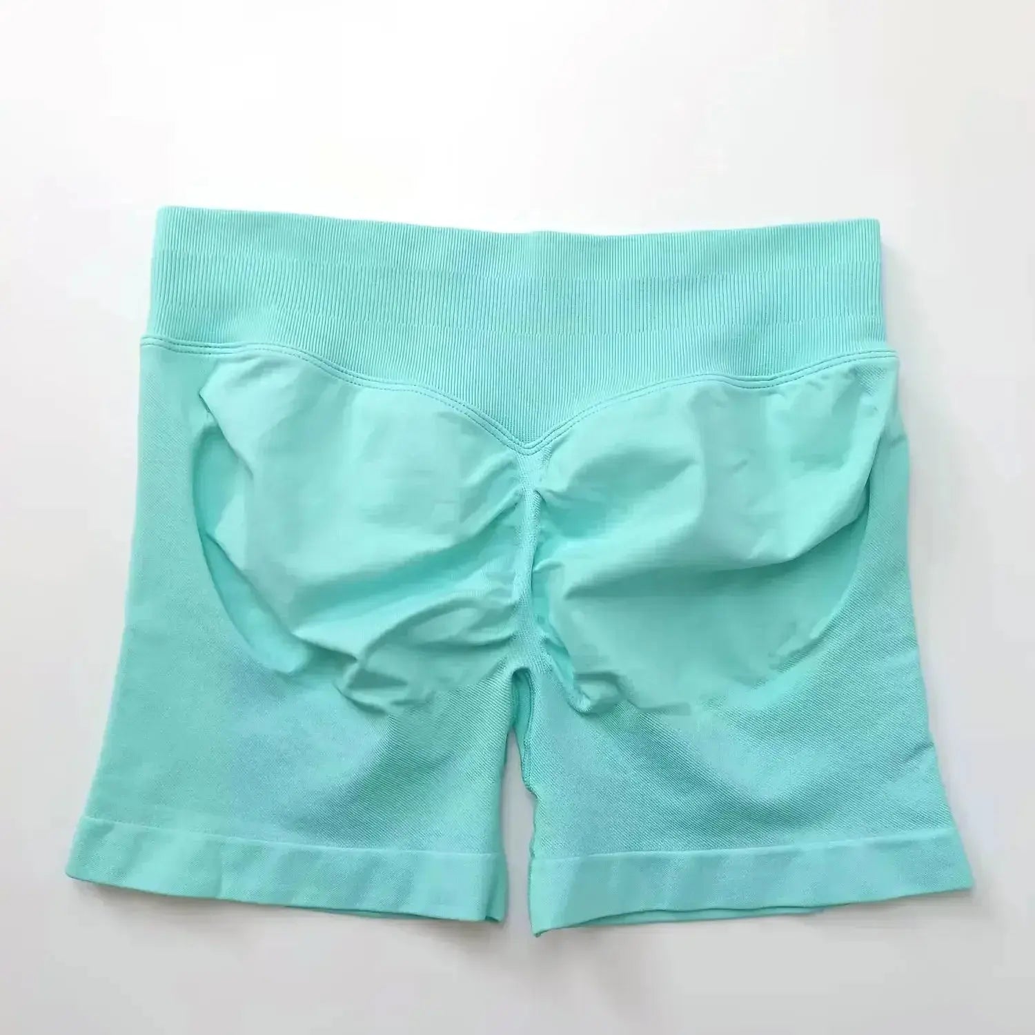 Women's seamless gym shorts with scrunch butt design by NCLAGEN, ideal for high-performance fitness and yoga workouts.