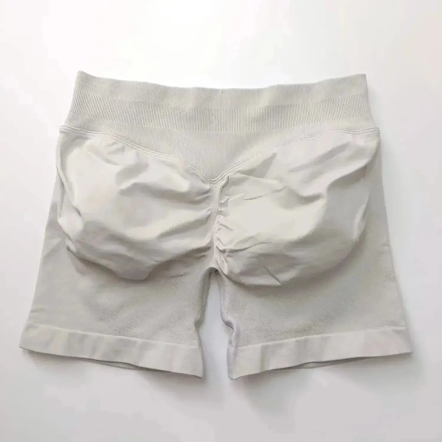 Women’s seamless scrunch butt gym shorts for fitness and yoga, designed for high-performance workouts by NCLAGEN Gym Wear.
