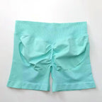 Women's seamless scrunch butt gym shorts for high-performance fitness and yoga, made by NCLAGEN Gym Wear.