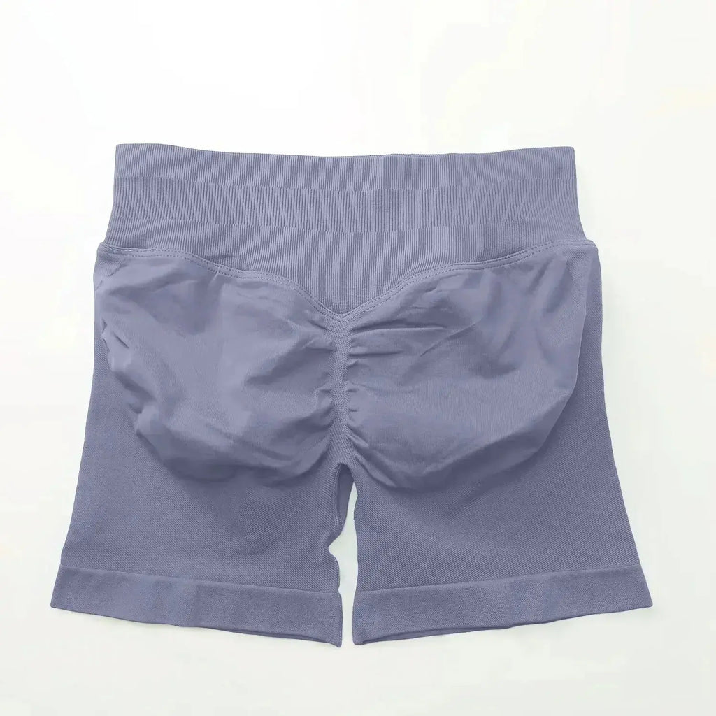 Women's seamless scrunch butt gym shorts for high-performance fitness and yoga by NCLAGEN, showcasing comfortable stretch fabric and sleek design.