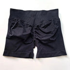 Women's seamless scrunch butt gym shorts by NCLAGEN Gym Wear, designed for high-performance fitness and yoga activities.