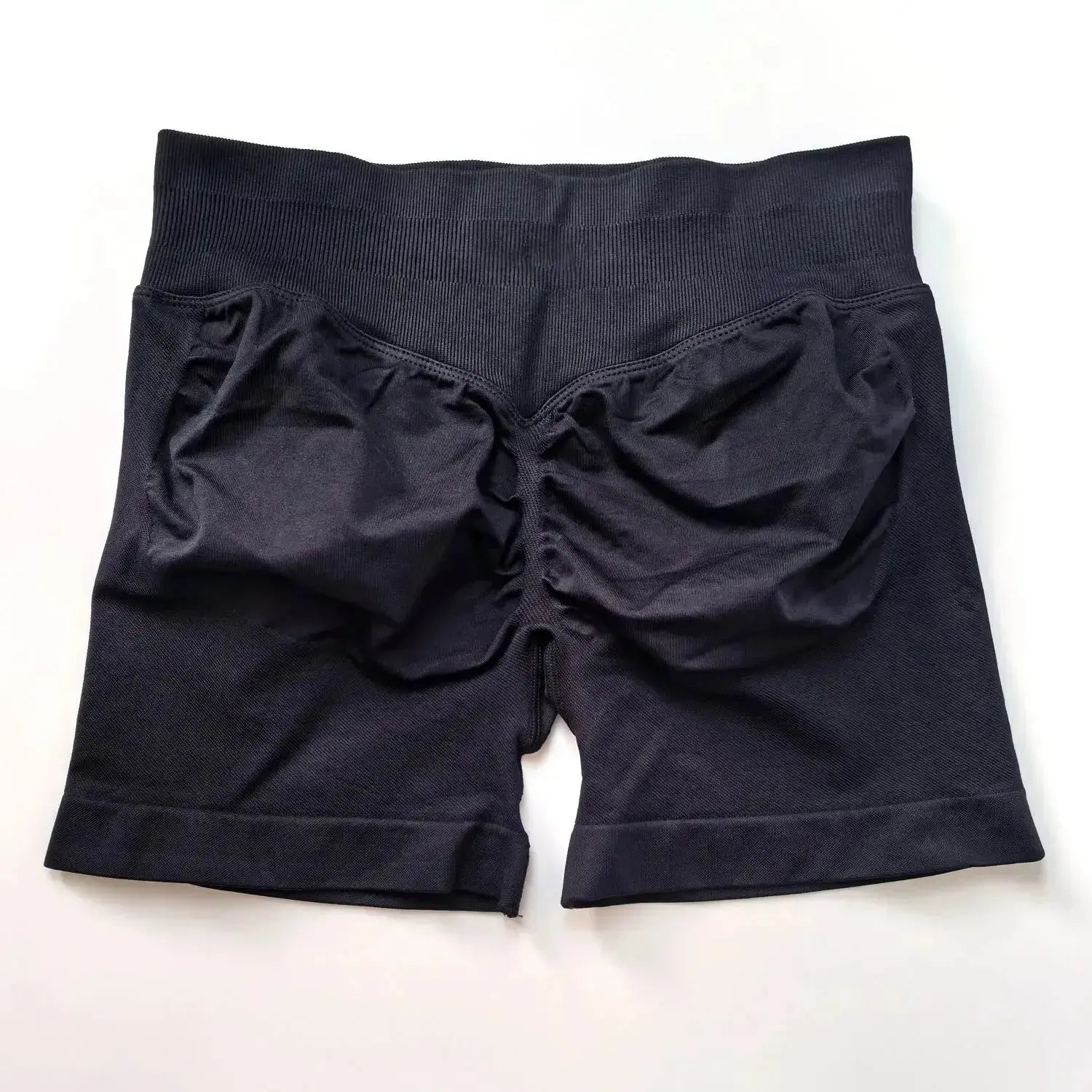 Women’s seamless scrunch butt gym shorts for fitness and yoga, designed by NCLAGEN Gym Wear, showcasing a high-performance workout look.