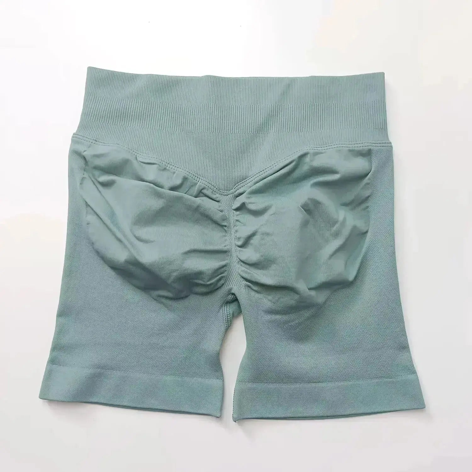 Women's seamless scrunch butt gym shorts for fitness and yoga, designed for high-performance workouts, by NCLAGEN Gym Wear.