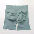 Women's seamless scrunch butt gym shorts for fitness and yoga, designed for high-performance workouts by NCLAGEN Gym Wear.