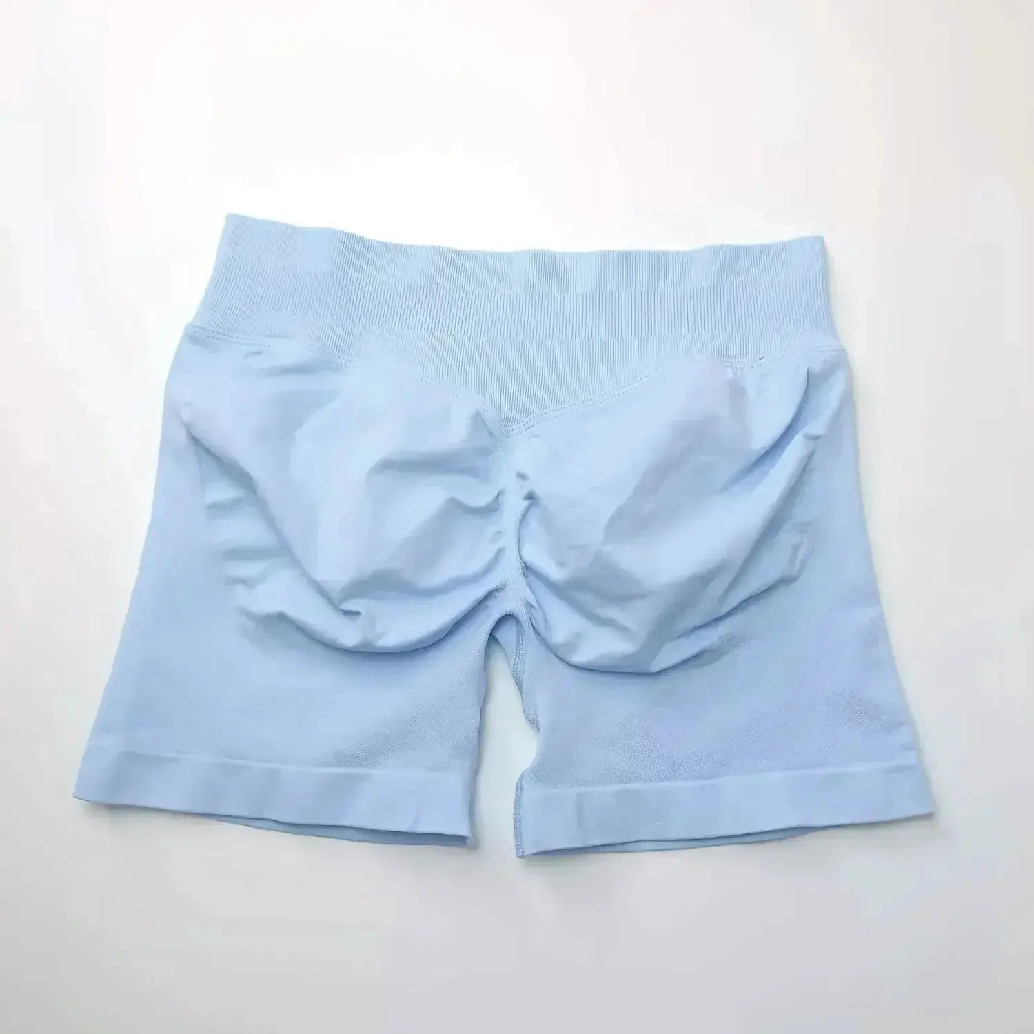 Women's seamless scrunch butt gym shorts by NCLAGEN Gym Wear, designed for fitness and yoga with a high-performance fit.