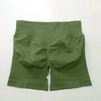 Women's seamless gym shorts with scrunch butt design, high-performance fitness and yoga leggings by NCLAGEN Gym Wear.