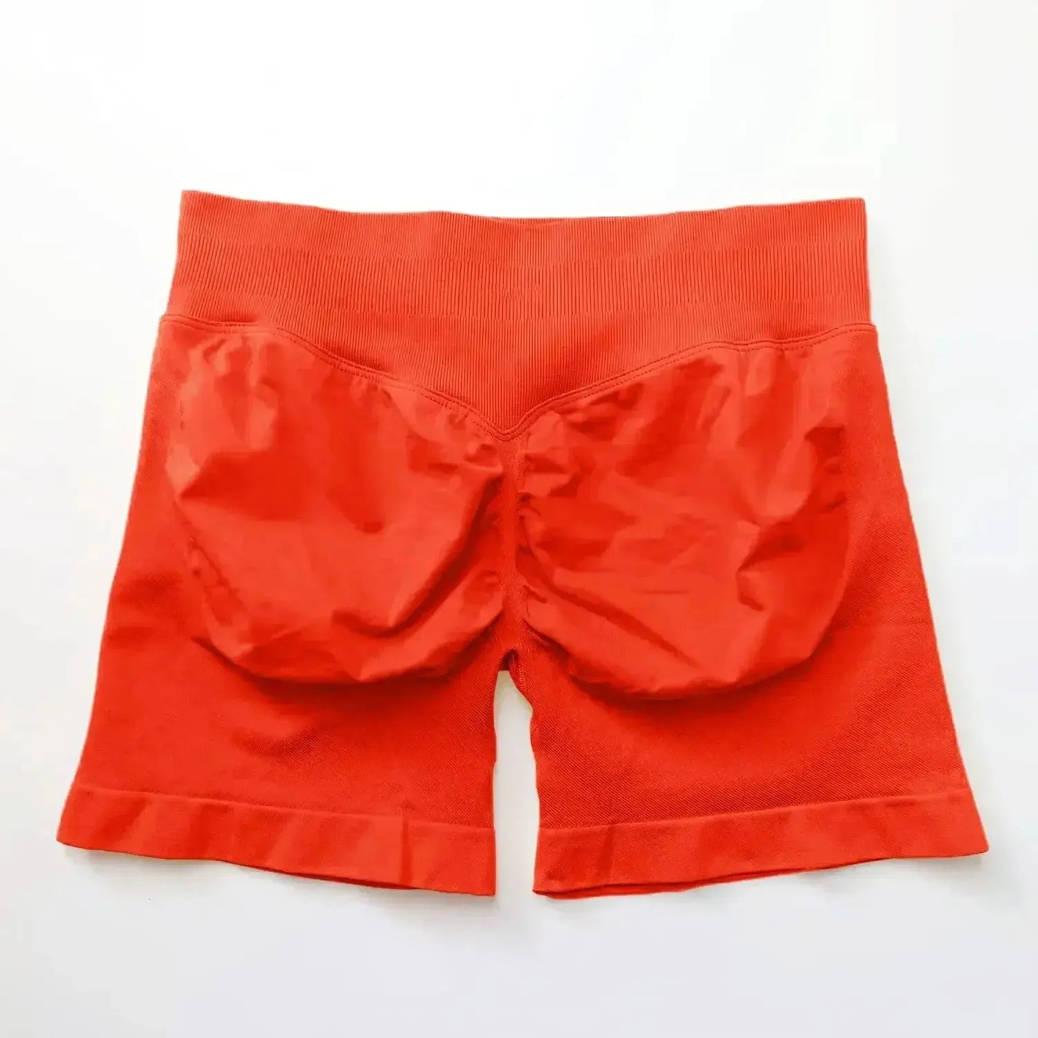 Women's seamless scrunch butt gym shorts by NCLAGEN, ideal for high-performance fitness and yoga workouts.