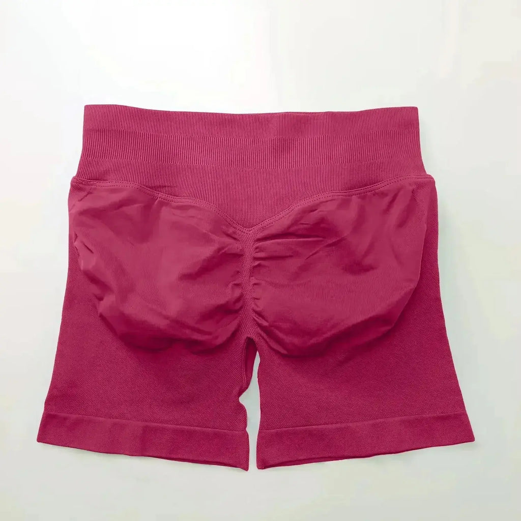 Women's seamless scrunch butt gym shorts for fitness and yoga, designed for high-performance workouts by NCLAGEN Gym Wear.