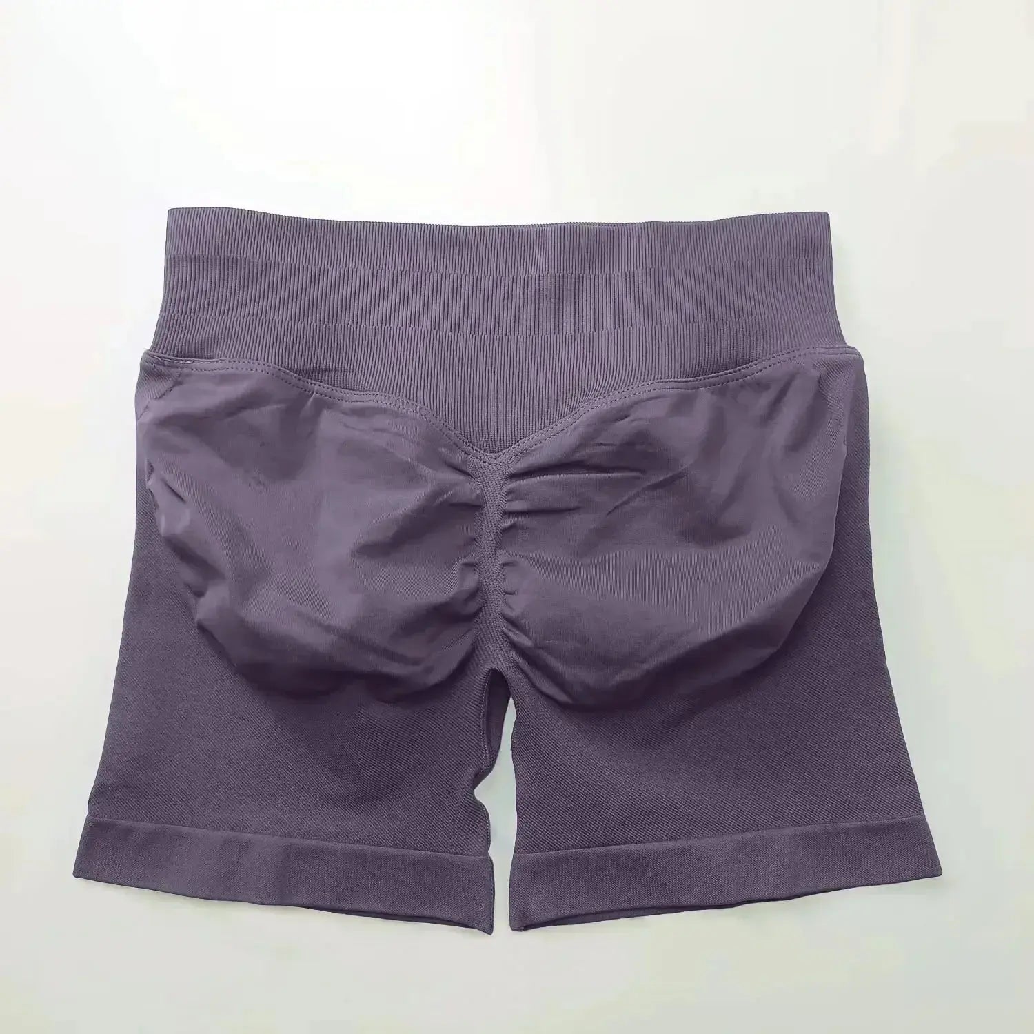 Women's seamless scrunch butt gym shorts by NCLAGEN Gym Wear, designed for high-performance fitness and yoga activities.