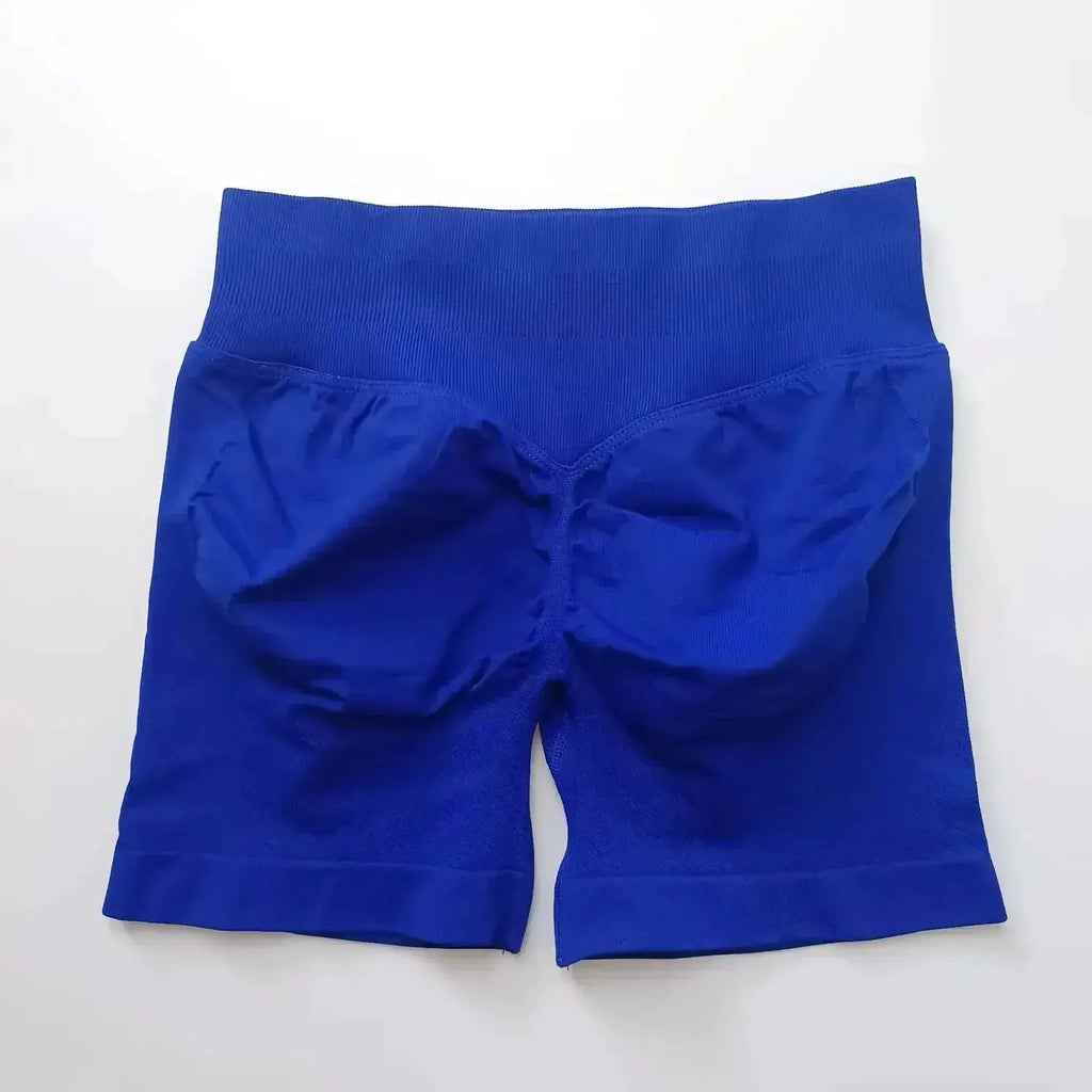 Women's seamless scrunch butt gym shorts for fitness and yoga, designed for high-performance workouts by NCLAGEN Gym Wear.