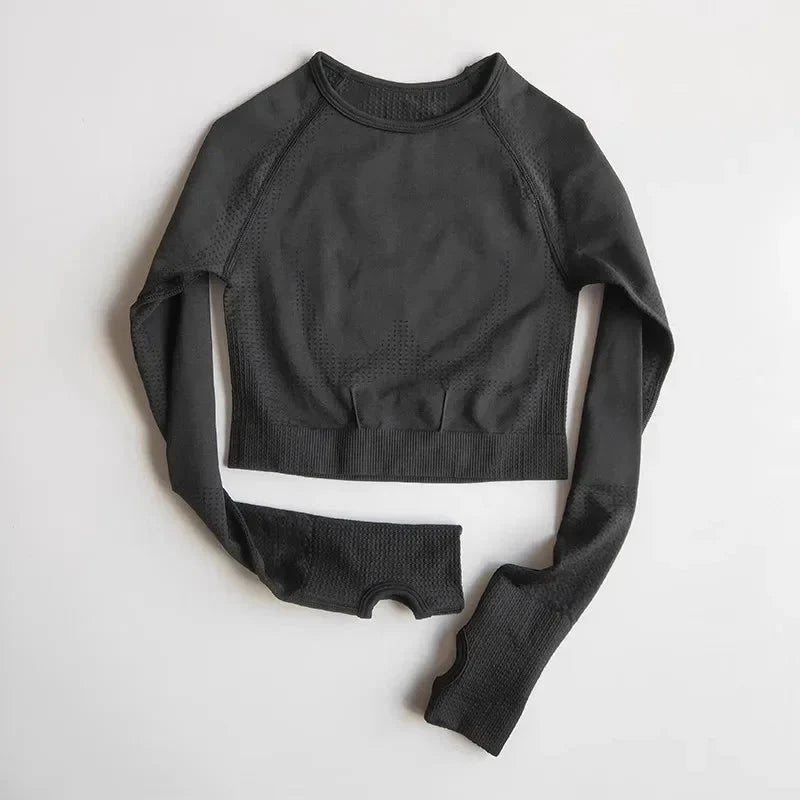 Seamless women’s yoga crop top in activewear style, made by Plush Fashion Hub, shown in a neutral color with a fitted design.