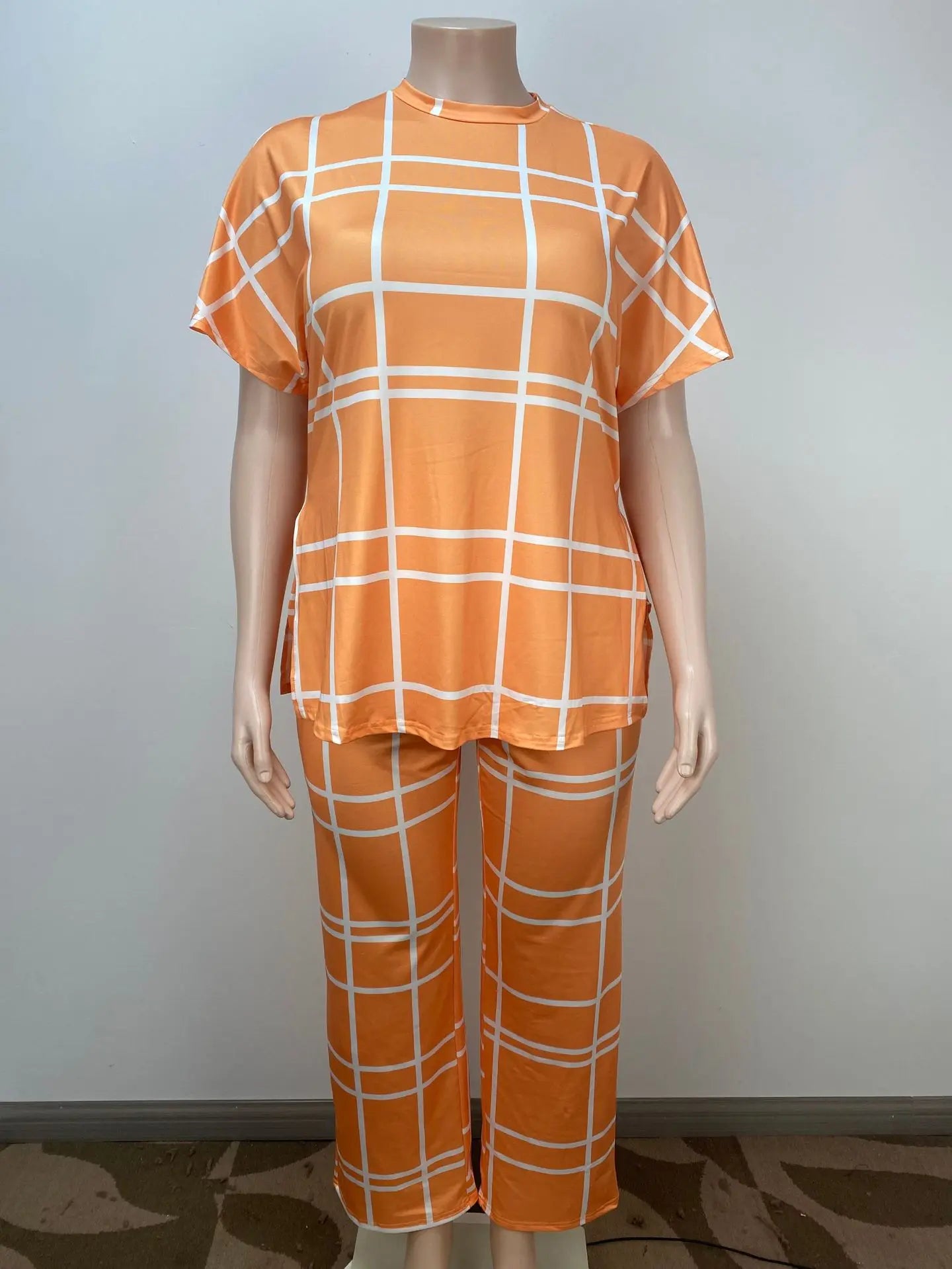 Plus size women’s Elements striped grid printed casual two-piece set with round neck top, by Plush Fashion Hub.