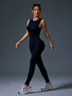 Seamless sleeveless yoga jumpsuit with zipper closure in black from Plush Fashion Hub, designed for activewear and comfortable movement.