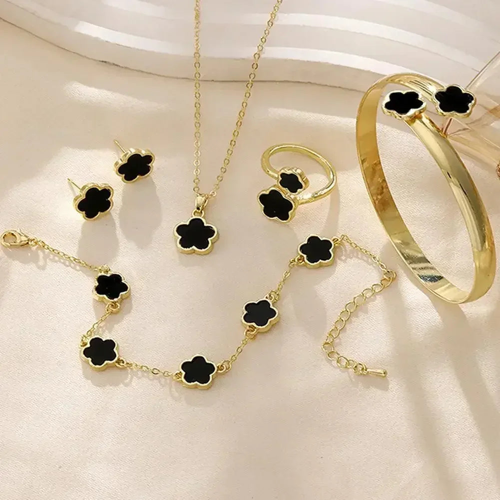 Plum blossom plant five leaf flower necklace and earring set with delicate floral jewelry from Plush Fashion Hub.