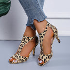 Leather high heels shoes from Plush Fashion Hub, stylish footwear with pointed toes and sleek design, shown in black.