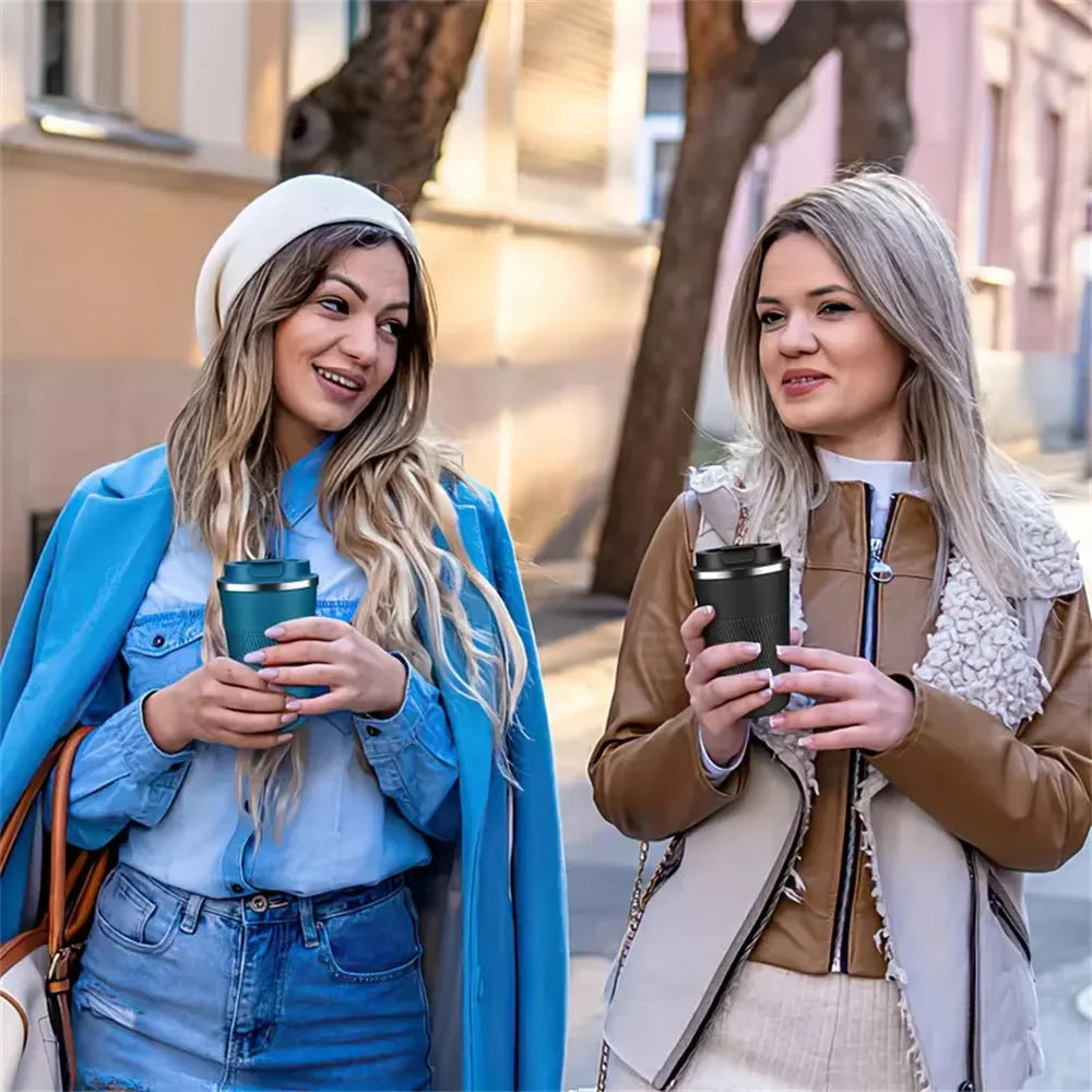 Stainless steel insulated travel mug by Plush Fashion Hub with double-layer design, leak-proof lid, perfect for sports and outdoor use